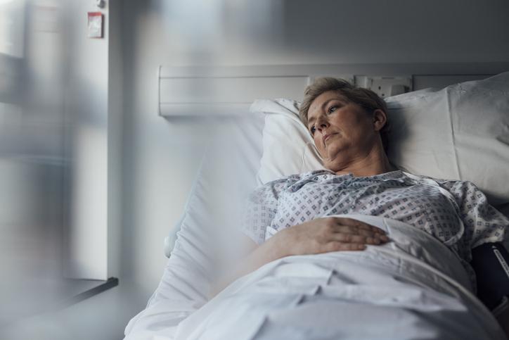 Patient In Hospital Bed